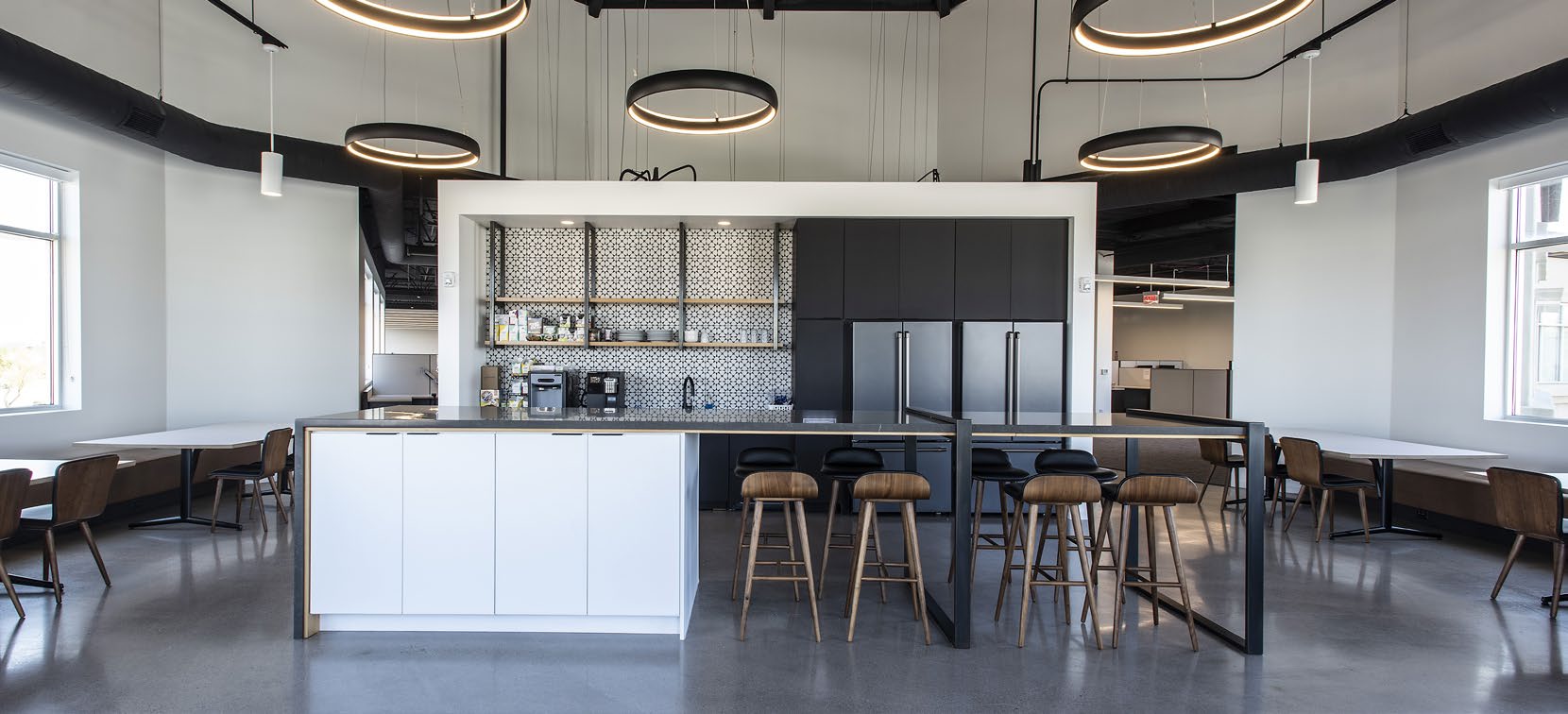 Open kitchen and break area with island seating